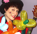 Outdoor on-site Clown Singing Telegram performed at a safe distance outside on your front porch or front yard. Professional trained singer/recording artist sings a silly song and composes an original song for the recipient.