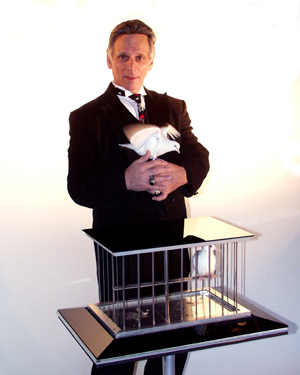 John- top professional Magician, live appearing doves, illusions, magic show or strolling sleight of hand close up magic, animal balloon art, magic show for all ages, kids birthday party Magician New Jersey, optional Halloween or Christmas themed magic show, Magician NJ, his credentials include Great Adventure theme park stage show, illlusion shows, TV magic, Mrs America Pageant in AC, award winning NYC Master of Magic, 2-time winner of MAES Magic Convention, and stage show producer