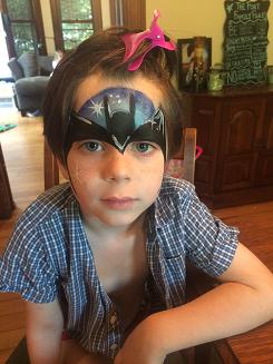 Artist Ariana- superhero face painting, bat hero face art