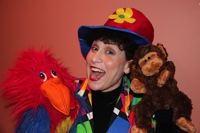 Eva- Musical Clown entertainer for kids parties in New Jersey, musican, singer, guitarist, musical kids show includes singing, dancing, comical singing puppets, percussion instruments for the children, magic show, animal balloons and optional face painting or tattoos                   (click on photo to see Puppet Show photos)